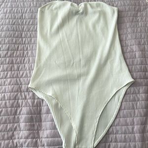 Cream body suit